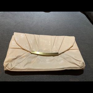 Cream clutch with sheen. Used once